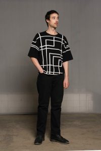 Cashmere t-shirt, black with white abstract shapes for women and men.