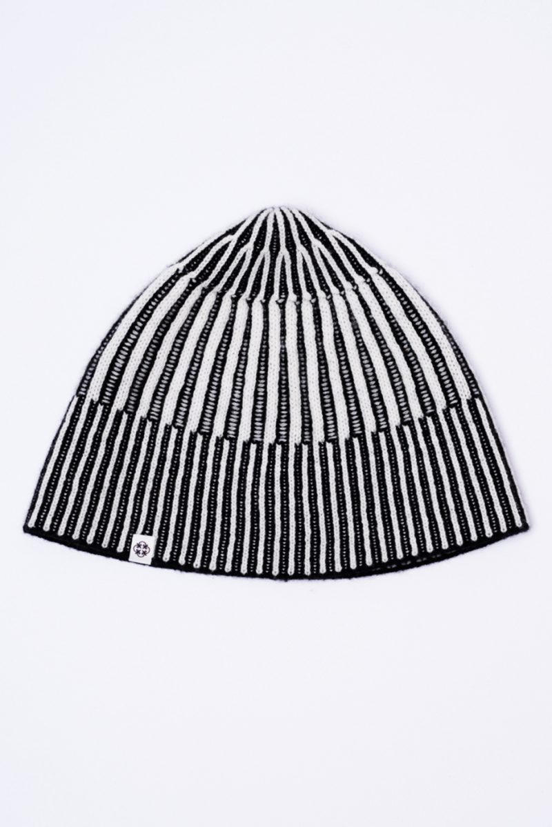 Cashmere beanie, black and white, abstract and geometric shapes.