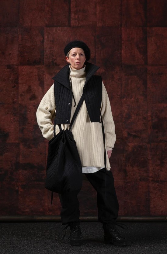 Jan-Jan Van Essche look with a cream Sartuul wool turtleneck sweater under a black quilted vest