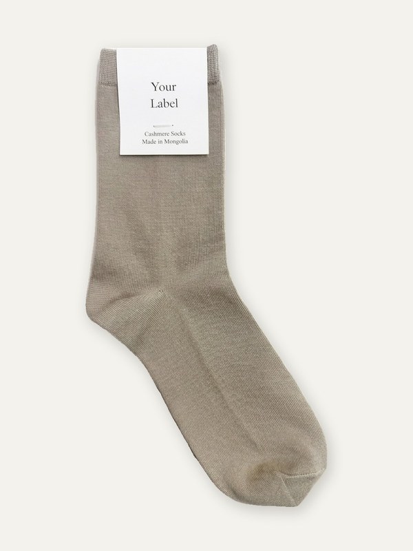 Fine 18 gauge cashmere sock in grey with a Your Label paper tag